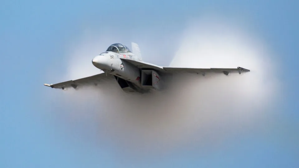 What is the sound barrier, and how is it broken?