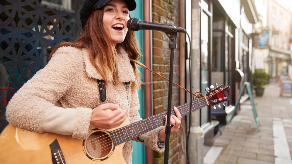 Which cities host the most rewarding busking experiences?