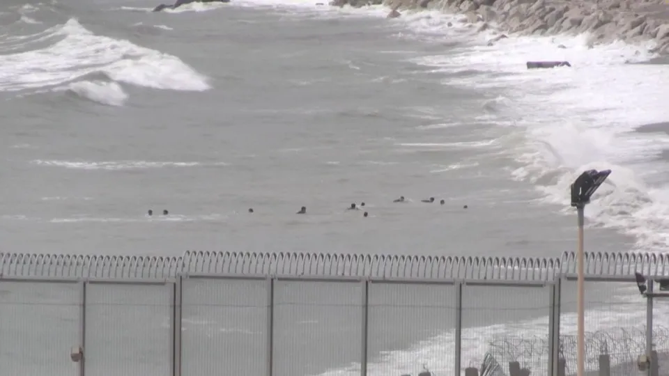 Migrants swim from Morocco to Ceuta as officials warn of reception system collapse