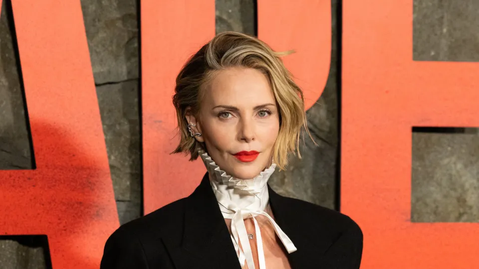 Charlize Theron goes shirtless in daring open blazer at Netflix's 'Apex' premiere